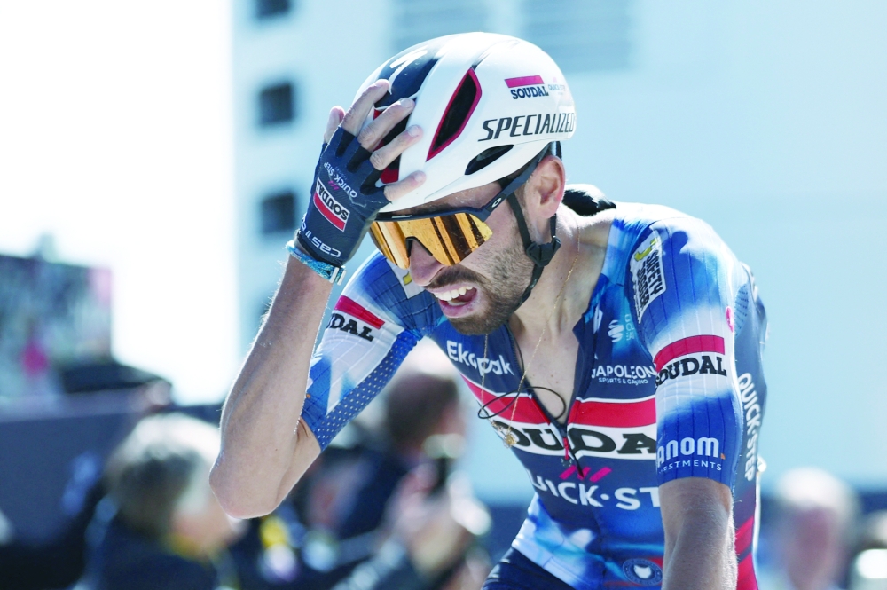 Soudal Quick-Step's Valentin Paret Peintre celebrates winning stage 16. — Reuters