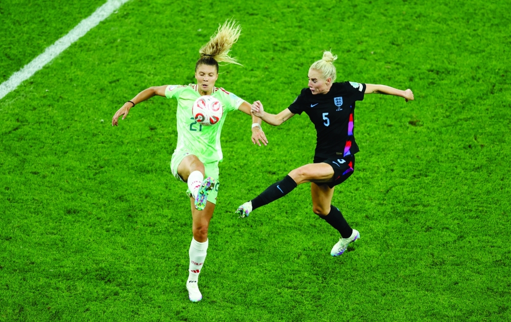 
Italy’s Michela Cambiaghi in action with England’s Alex Greenwood. — Reuters 