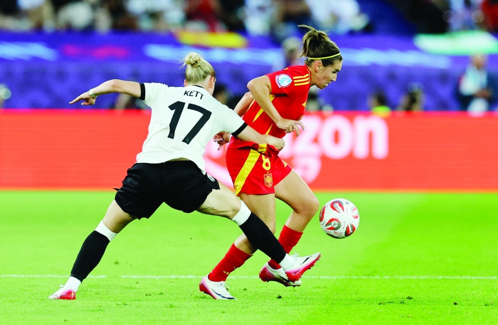 Spain's Mariona Caldentey in action with Germany's Franziska Kett. — Reuters