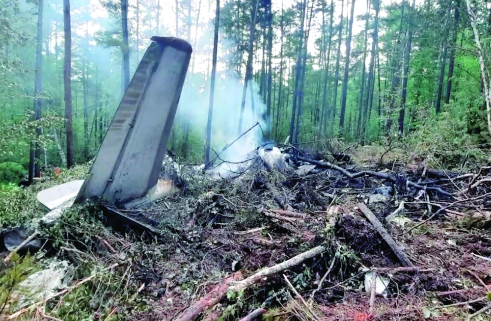 
A view shows the debris of an Angara Airlines An-24 passenger aircraft at the crash site in the Amur Region. — Reuters 