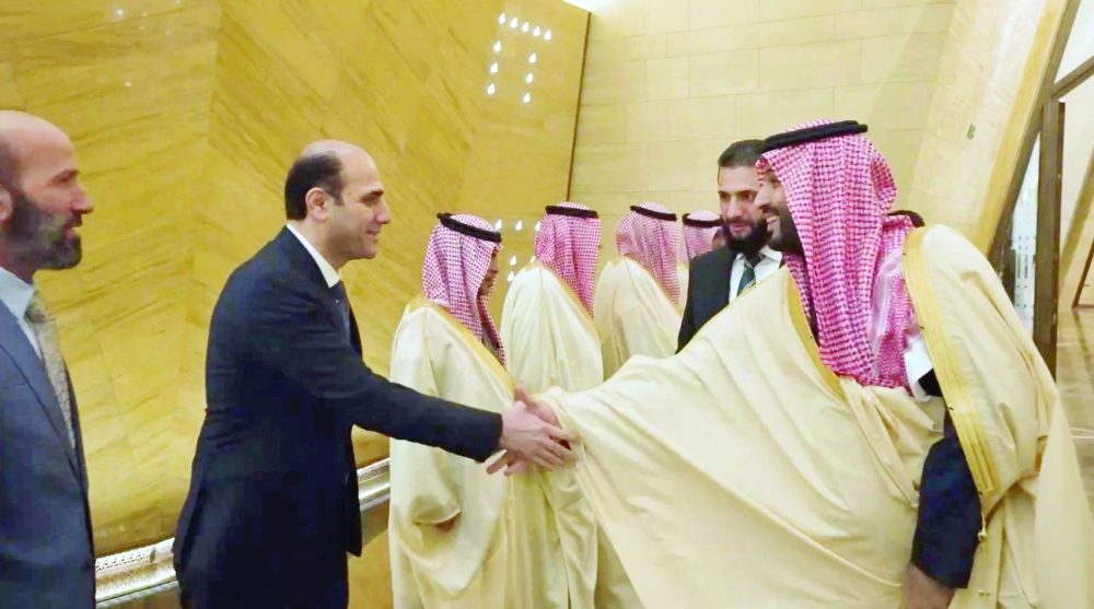 
Saudi Crown Prince Mohammed bin Salman with Hazem al Sharaa, the brother of Syrian President Ahmed al Sharaa, in Riyadh. — Reuters 