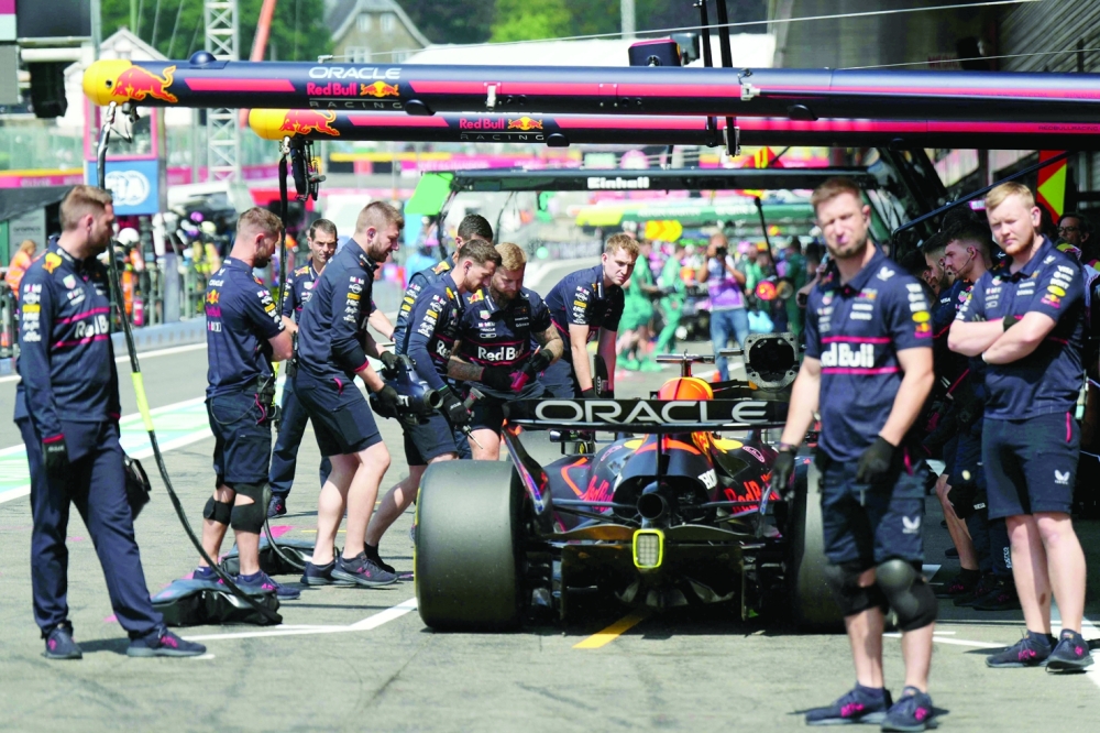 Verstappen makes a stop in pit during the first practice. — AFP