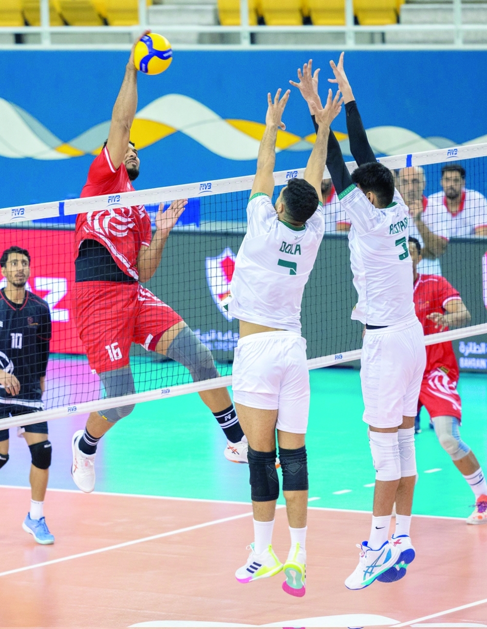 Oman and Saudi Arabia players in action