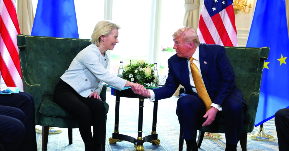 US President Donald Trump shakes hands with European Commission President Ursula von der Leyen, in Turnberry, Scotland, Britain. — Reuters