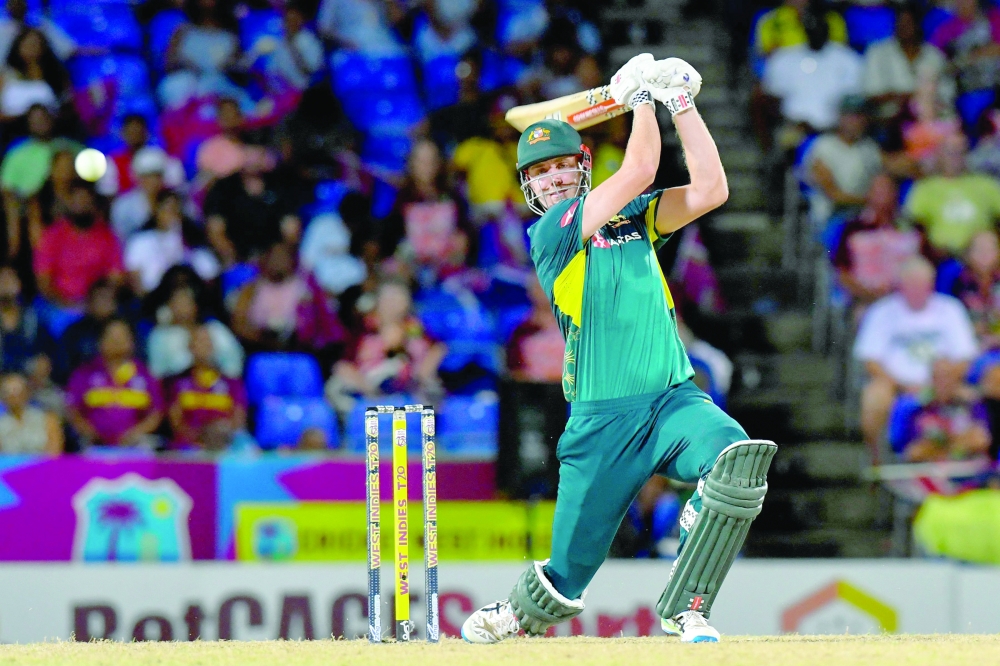 Cameron Green of Australia hits 4 during the fifth and final Twenty20 (T20) international cricket match between West Indies and Australia at Warner Park Sporting Complex in Basseterre. — AFP