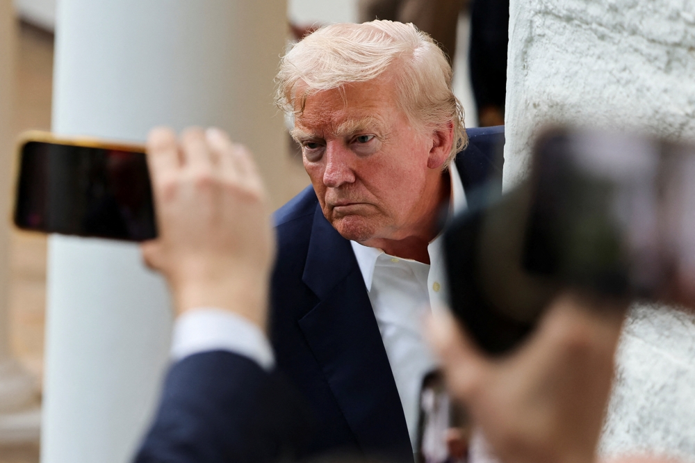 U.S. President Trump returns from Scotland, at the White House in Washington