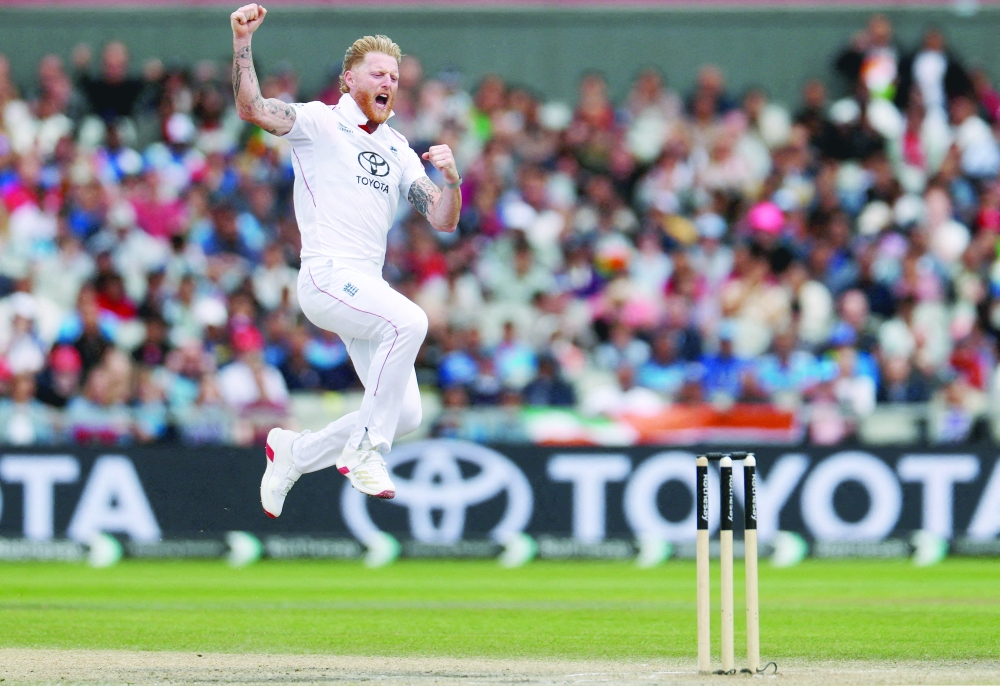 England's Ben Stokes celebrates after taking the wicket of India's KL Rahul. — Reuters