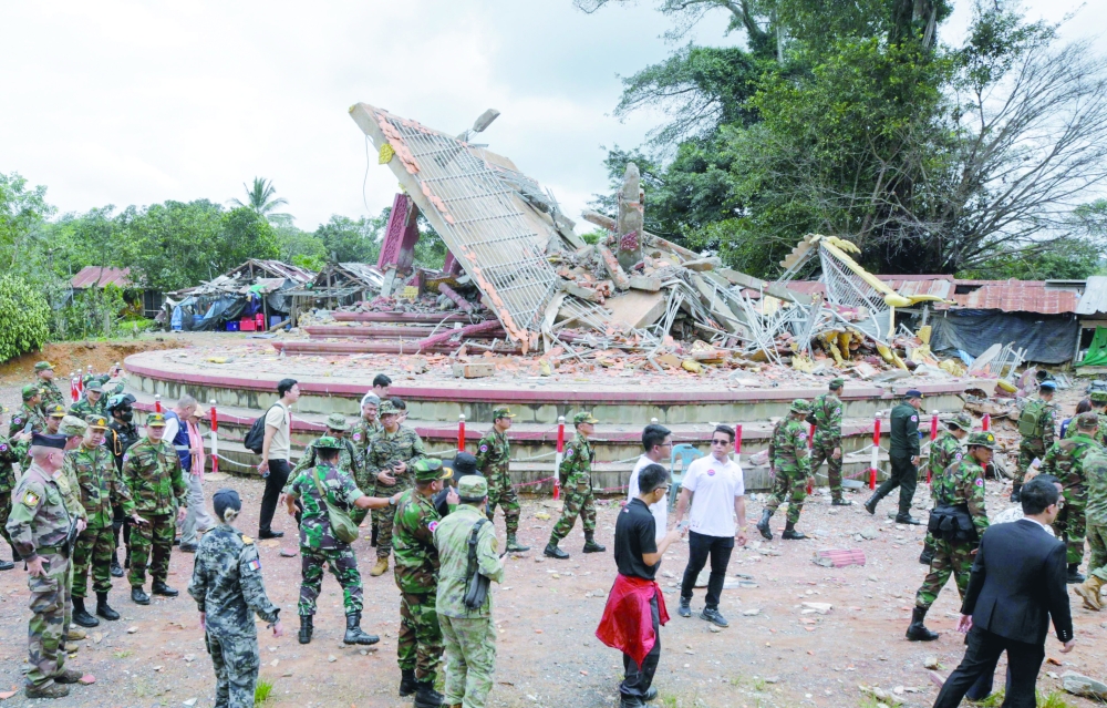 
Military attaches and diplomats from 13 countries observe the implementation of the Cambodia-Thailand ceasefire in Cambodia’s Preah Vihear province. — AFP 