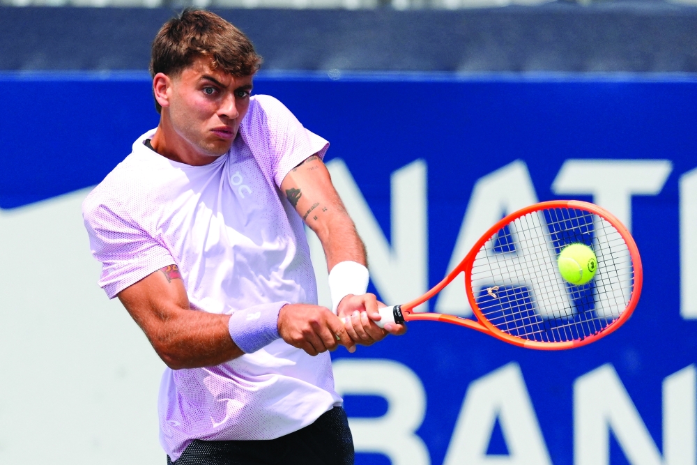 Flavio Cobolli (ITA) hits a ball to Alexis Galarneau (not pictured) during the second round at Sobeys Stadium. — Reuters