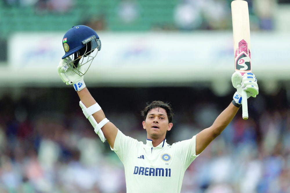 India's Yashasvi Jaiswal celebrates after reaching his century. — Reuters 