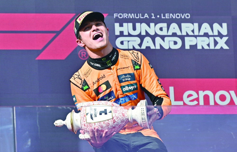 
McLaren’s Lando Norris celebrates on the podium. — Reuters 