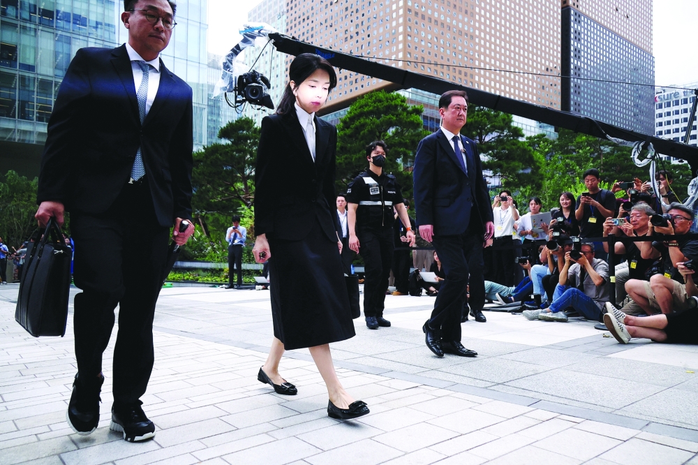 South Korea's former first lady Kim Keon Hee arrives at the special prosecutor's office in Seoul. — Reuters File
