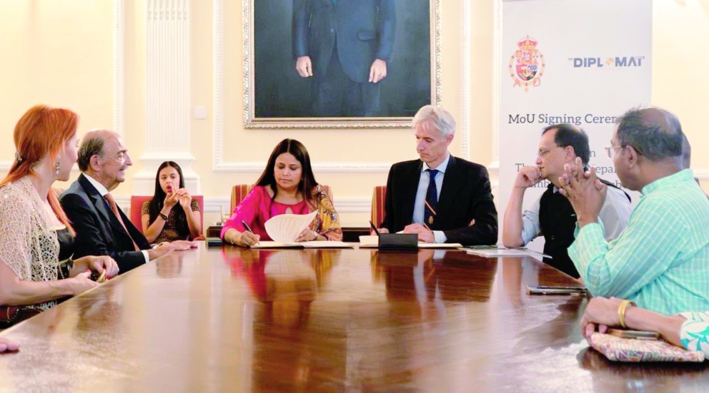 Santiago Velo de Antelo and Dr Sarmila Parajuli Dhakal, signing the MoU on behalf of Spain and The Diplomat Nepal