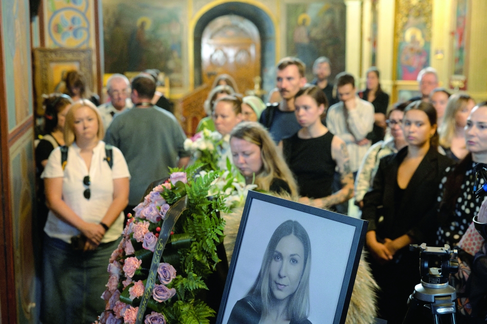 People attend the funeral ceremony for Ukrainian journalist Viktoria Roshchyna, who died in Russian captivity, at St Michael's Golden-Domed Cathedral, amidst Russia's attack on Ukraine, in Kyiv. — Reuters
