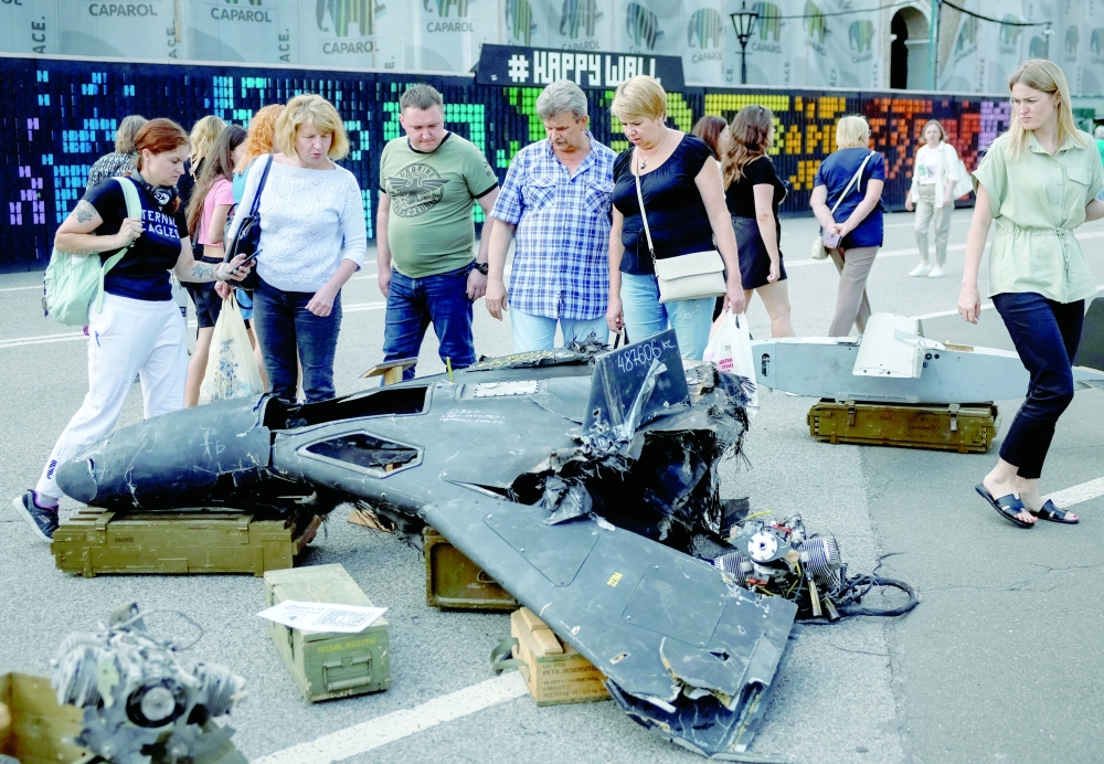 People look at a destroyed Russian combat drone as they visit an exhibition dedicated to Chasiv Yar defence by servicemen of 24th Mechanised brigade named after King Danylo of the Ukrainian Armed Forces, in central Kyiv, Ukraine. — Reuters