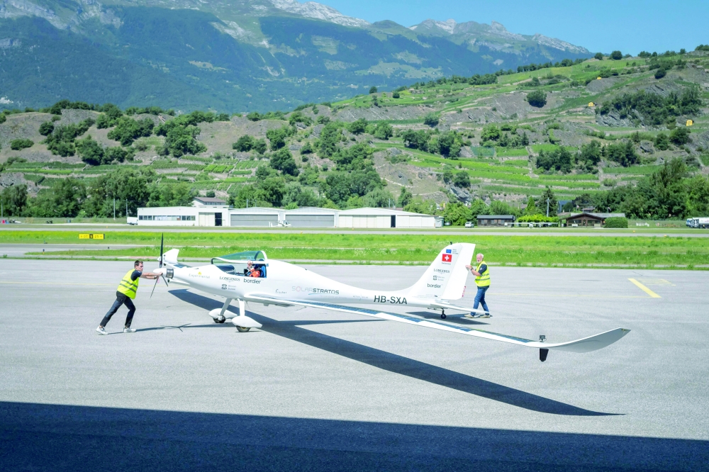 Raphael Domjan prepares to take off in Sion on Friday. — AFP