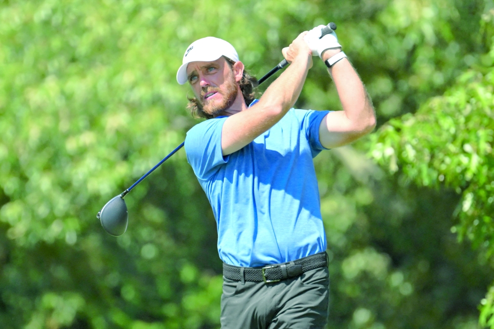 Tommy Fleetwood plays his shot from the seventh tee during the second round of the FedEx St. Jude Championship golf tournament. — Imagn Images 
