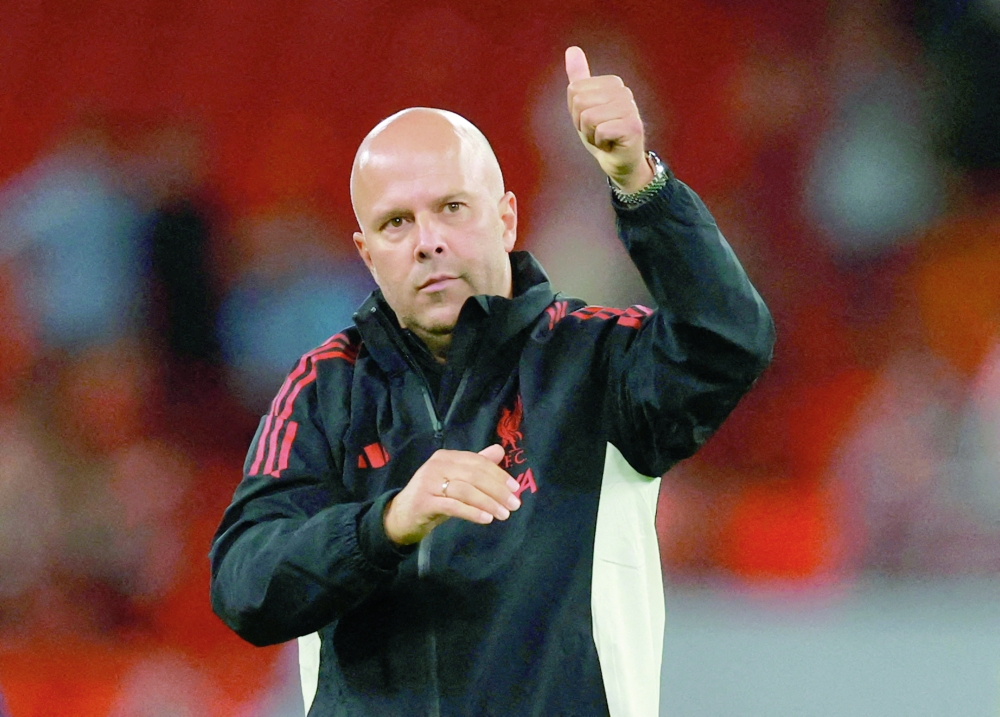 Liverpool manager Arne Slot acknowledges fans. — Reuters