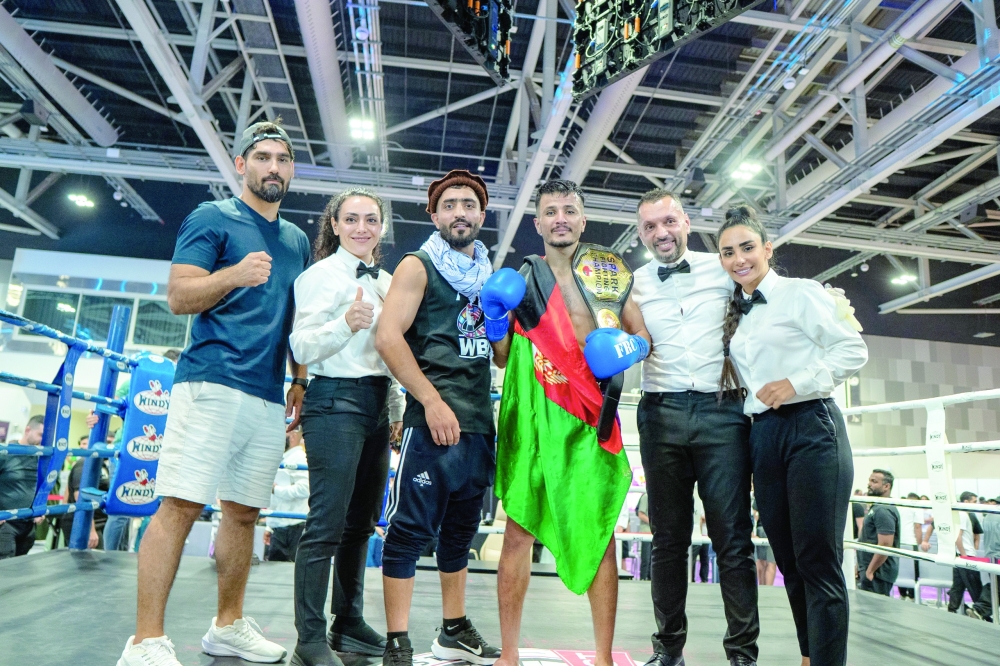 Afghan Jamal Azizi claimed the title in the main kickboxing bout
