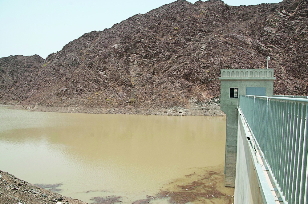 The dam's reservoir is engineered to safely manage floods that occur once in 10,000 years