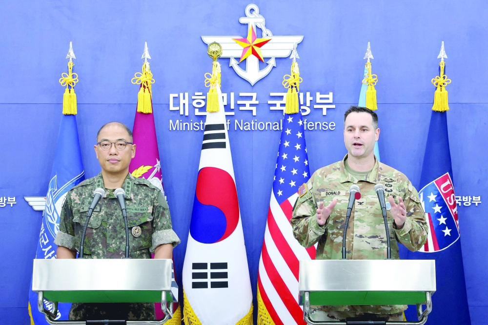 American, S Korean officials attend the press briefing at the Defence Ministry in Seoul. — AFP