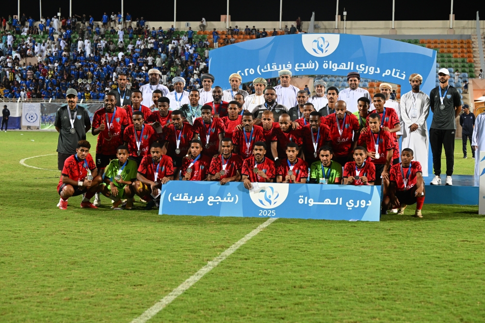 Al Muladah with their silver medals. -- Abdulwahid al Hamadani