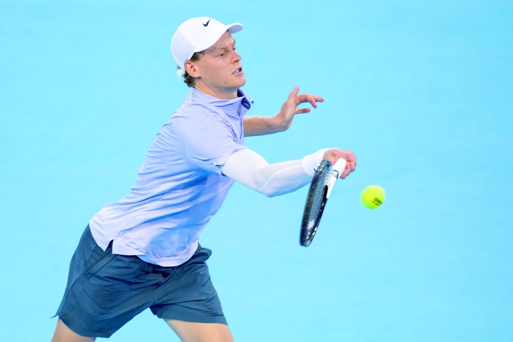 Jannik Sinner (ITA) returns a shot against Gabriel Diallo (CAN) during the Cincinnati Open at the Lindner Family Tennis Center. -- Imagn Images