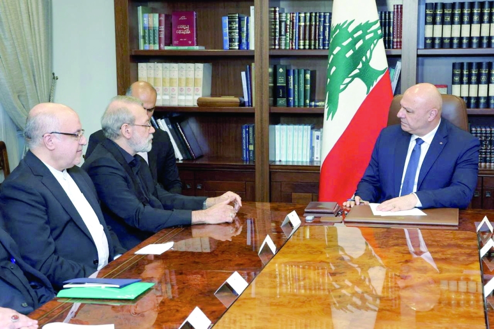 Iran's Supreme National Security Council Secretary Ali Larijani meets with Lebanese President Joseph Aoun (R) at the presidential palace in Baabda. — Reuters