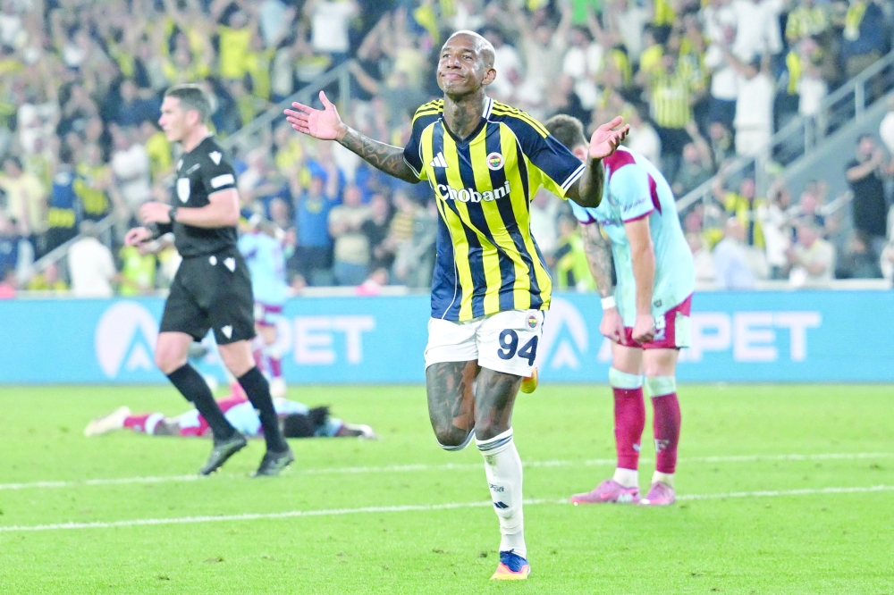 Fenerbahce's Brazilian midfielder #94 Talisca celebrates after scoring his team's fifth goal during the Uefa Champions League 3rd round second leg football match between Fenerbahce (TUR) and Feyenoord (NED) at the Fenerbahçe Sükrü Saracoglu Sport Complex in Istanbul on August 12, 2025. (Photo by Ozan KOSE / AFP)