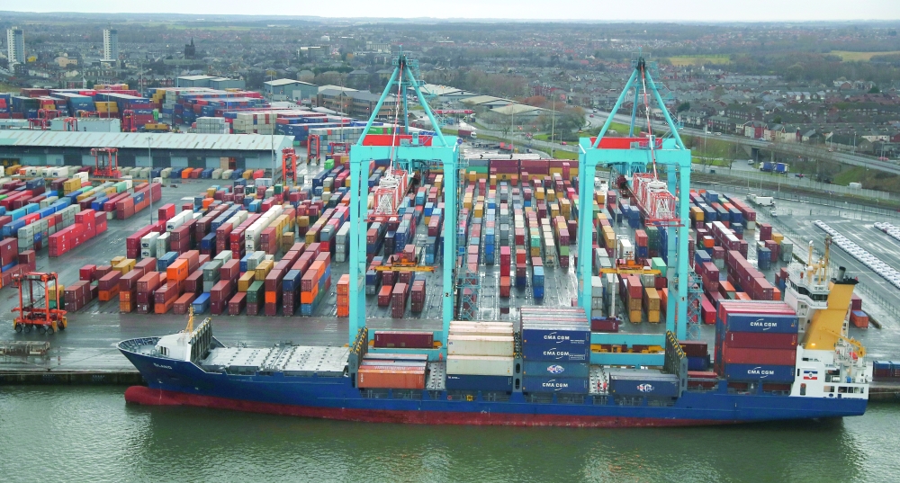 A container ship is unloaded at Peel Ports Liverpool container terminal in Liverpool, Britain. — Reuters