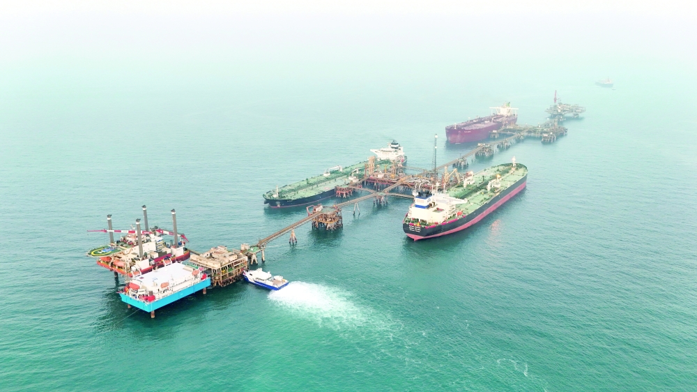 A drone view shows oil tankers loading crude oil at the Basra Oil Terminal in Iraqi territorial waters, off the coast of Basra, Iraq. — Reuters