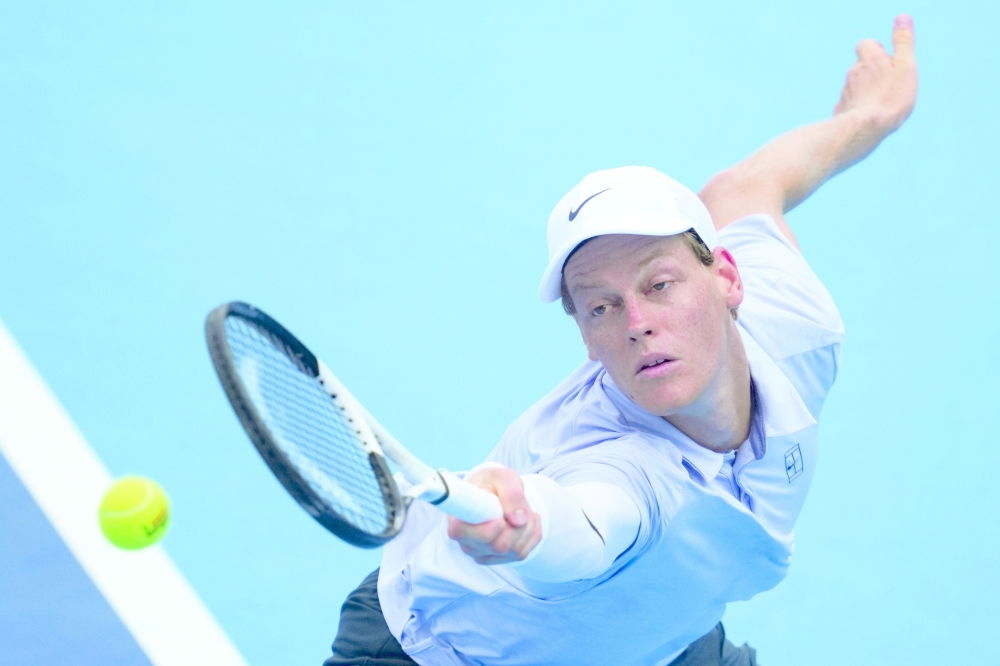 Jannik Sinner (ITA) returns a shot against Adrian Mannarino (FRA) during the Cincinnati Open at the Lindner Family Tennis Center. -- Imagn Images