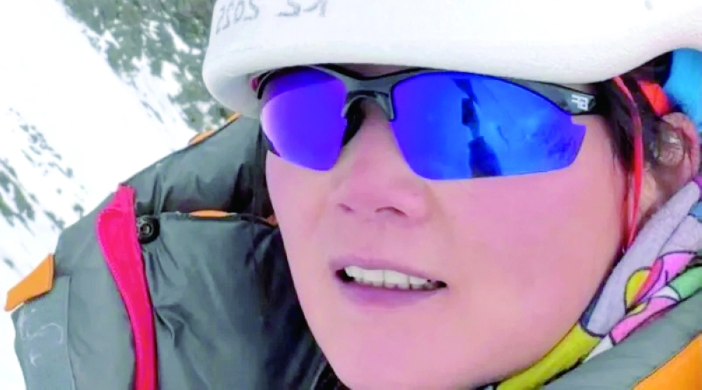 Chinese climber Guan Jing died after being struck by falling rocks while descending from the summit of K2.