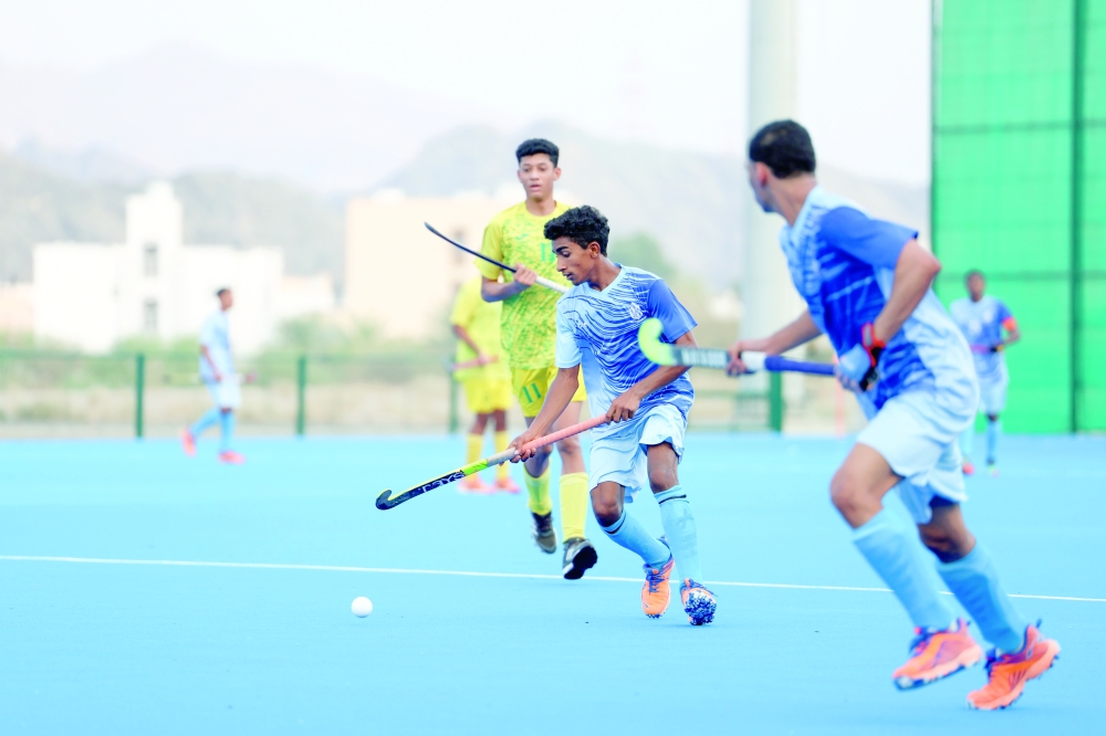 Masirah and Seeb players in action.
