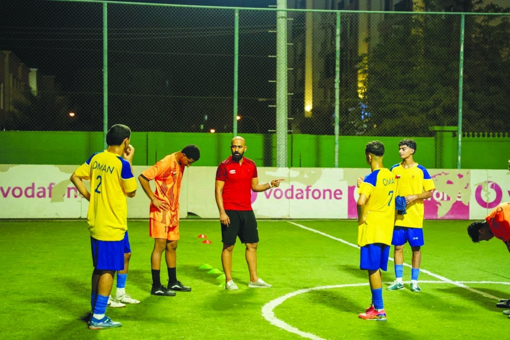 The Oman School Team during a training session