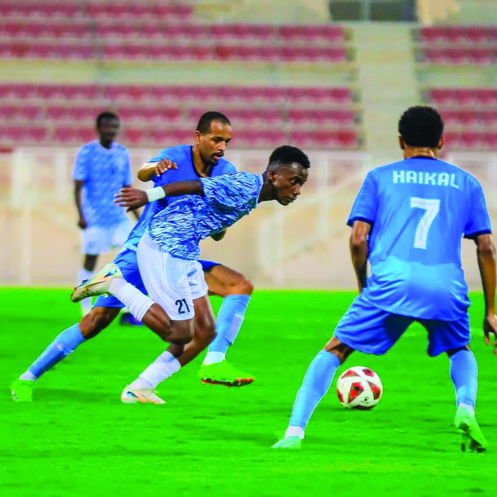 Al Nasr and Sur players in action.
