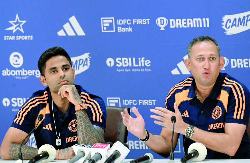 Indian captain Suryakumar Yadav (L) and Ajit Agarkar, chairman of selection committee, attend a press conference to announce T20 squad for upcoming Men's Asia Cup, in Mumbai on Tuesday. — AFP