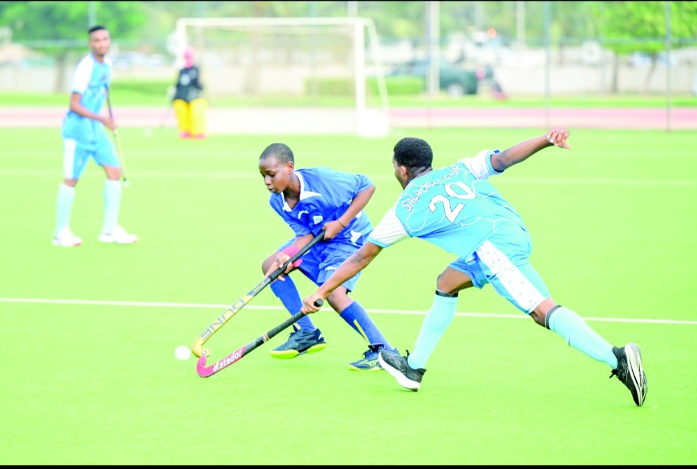 Salalah and Al Nasr players in action.