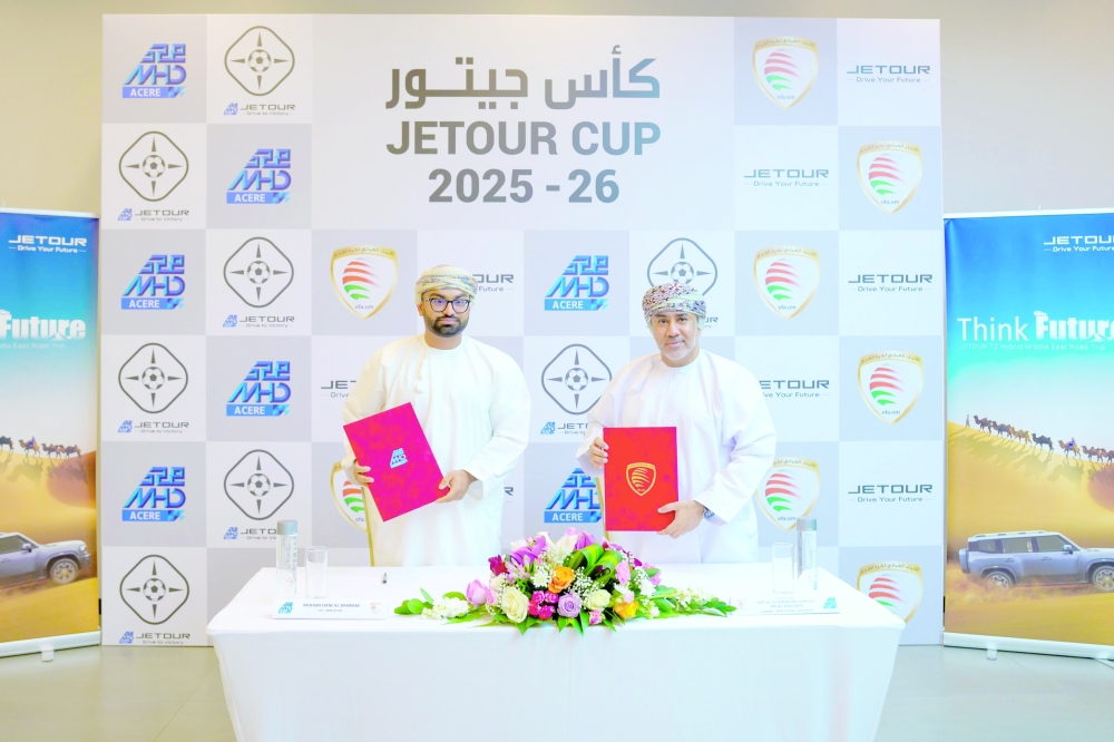 The MHD CEO and the OFA chairman during the signing ceremony.