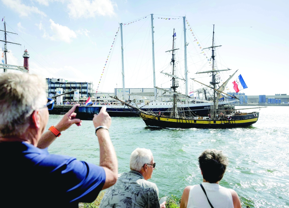 Tall ships sail into Amsterdam for giant maritime festival
