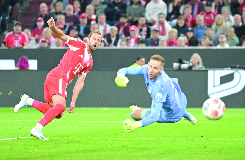 Harry Kane scores the sixth goal to complete a hat-trick. —Reuters