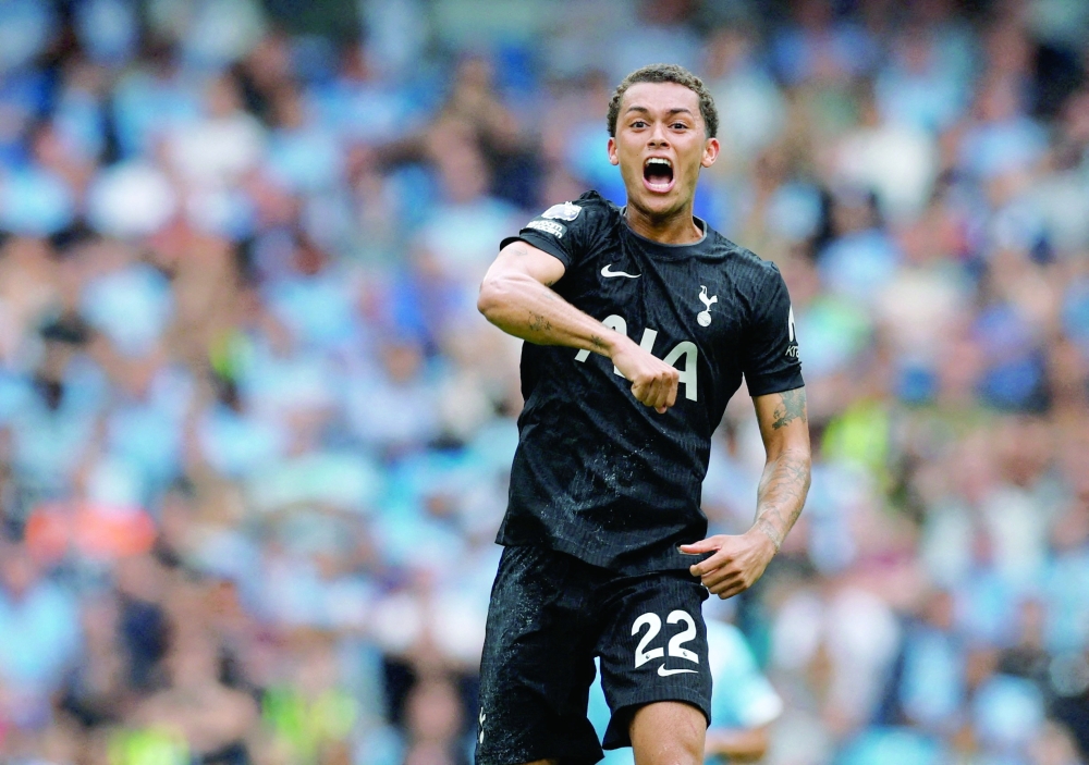 Tottenham's Brennan Johnson celebrates scoring the first goal. — Reuters