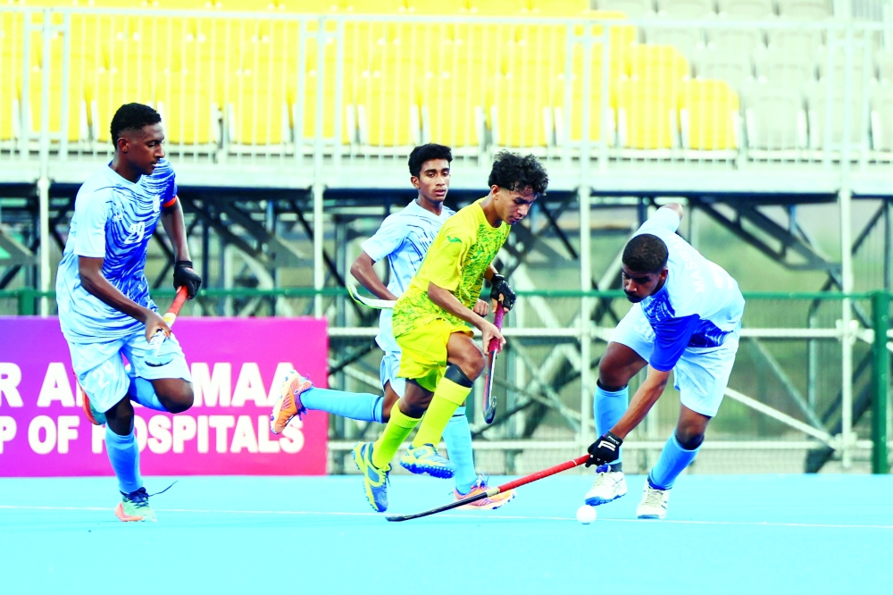 Masirah players press high and win possession from Seeb.