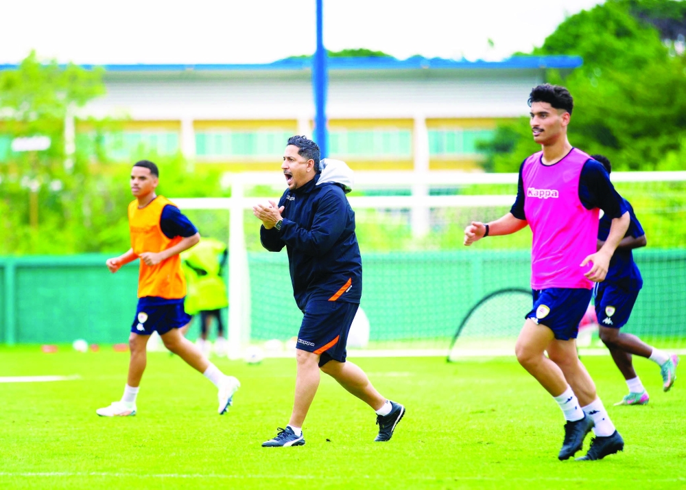 Coach Badar al Maimani guides the team in Thailand camp