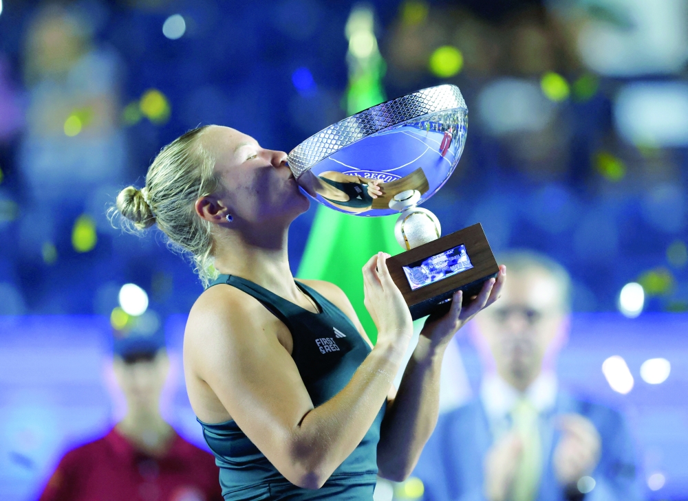 Russia's Diana Shnaider celebrates with the trophy after winning the Monterrey Open. — Reuters