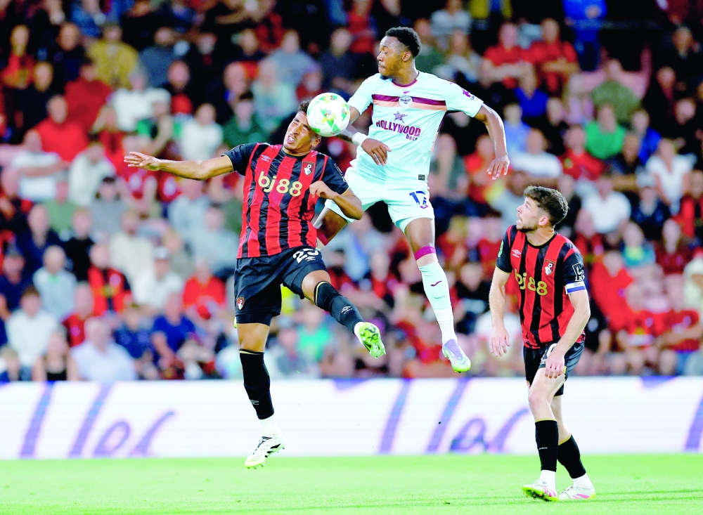 AFC Bournemouth's James Hill in action with Brentford's Antoni Milambo. — Reuters