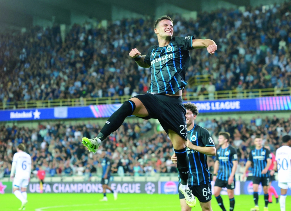 Club Brugge's Aleksandar Stankovic celebrates scoring their fifth goal against Rangers during the Uefa Champions League Play Off Second Leg match in Brugge, Belgium. — Reuters