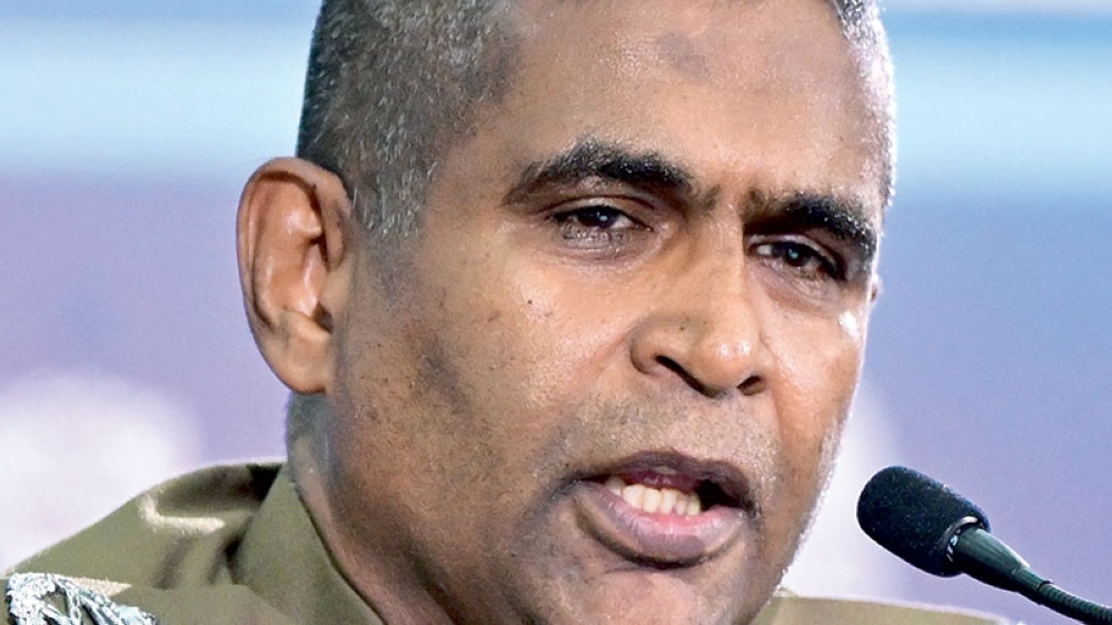Sri Lanka's Inspector-General of Police Priyantha Weerasooriya addresses a press conference in Colombo. - AFP