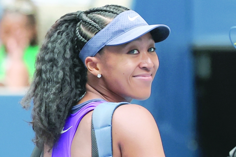 Japan's Naomi Osaka leaves the court after her victory over USA's Hailey Baptiste at the conclusion of their women's singles second round tennis match on day five of the US Open tennis tournament at the USTA Billie Jean King National Tennis Center in New York City, on August 28, 2025. (Photo by TIMOTHY A.CLARY / AFP)
