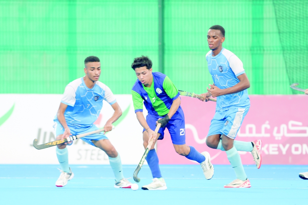 Ahli Sidab and Salalah players in action.
